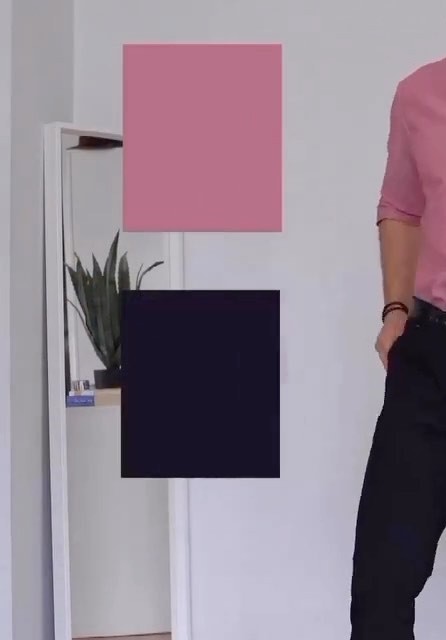 Torso and hip detail of the pink shirt tucked in, one hand in the trouser pocket, sleeve rolled to the forearm