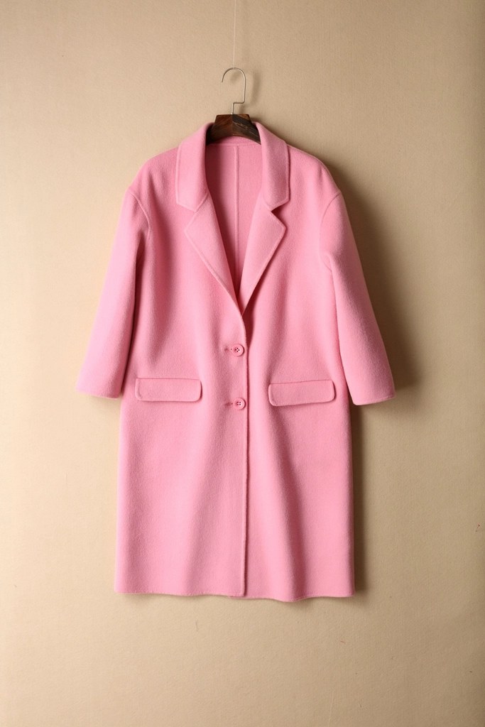 A single jacket on a hanger, showing the full garment hanging freely without surrounding pressure